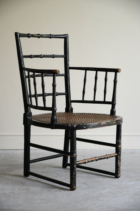 Early 19th Century Ebonised Cane Chair