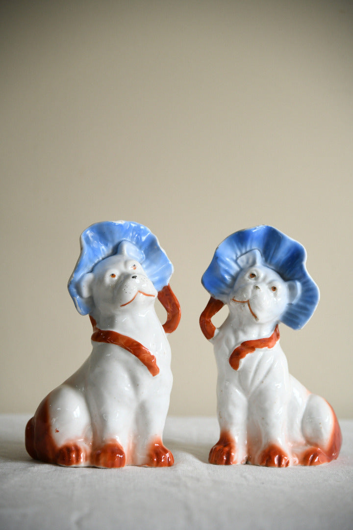 Pair of Vintage Porcelain Dog Figurines in Blue Bonnets