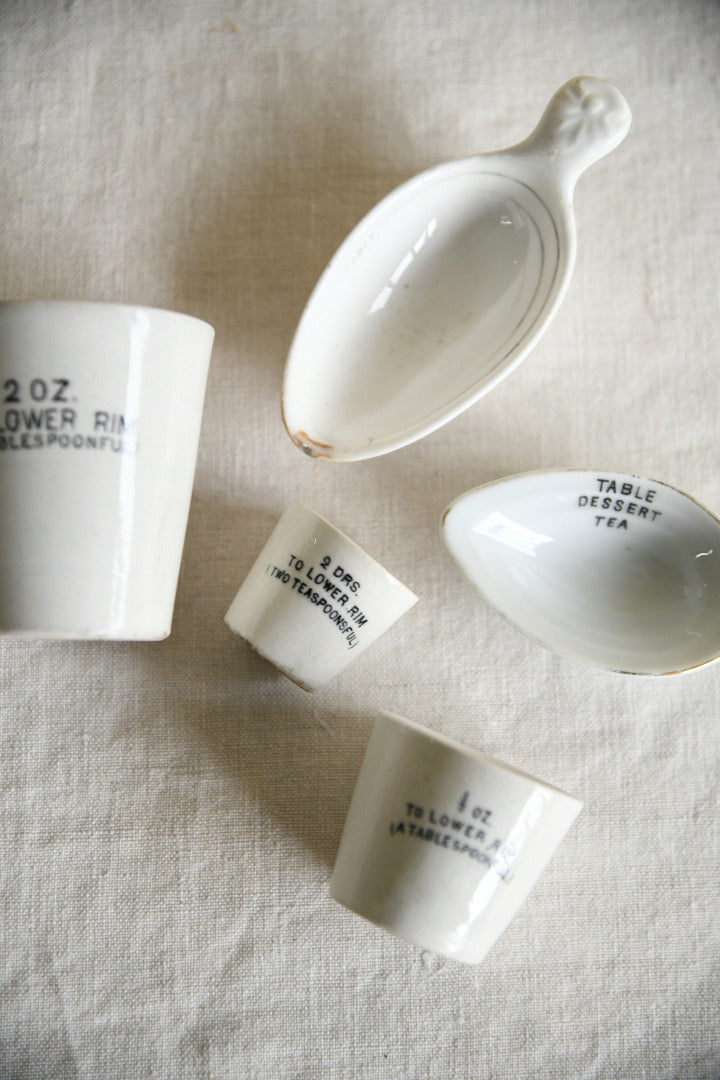 Collection of Vintage White Ironstone Medicinal Measures
