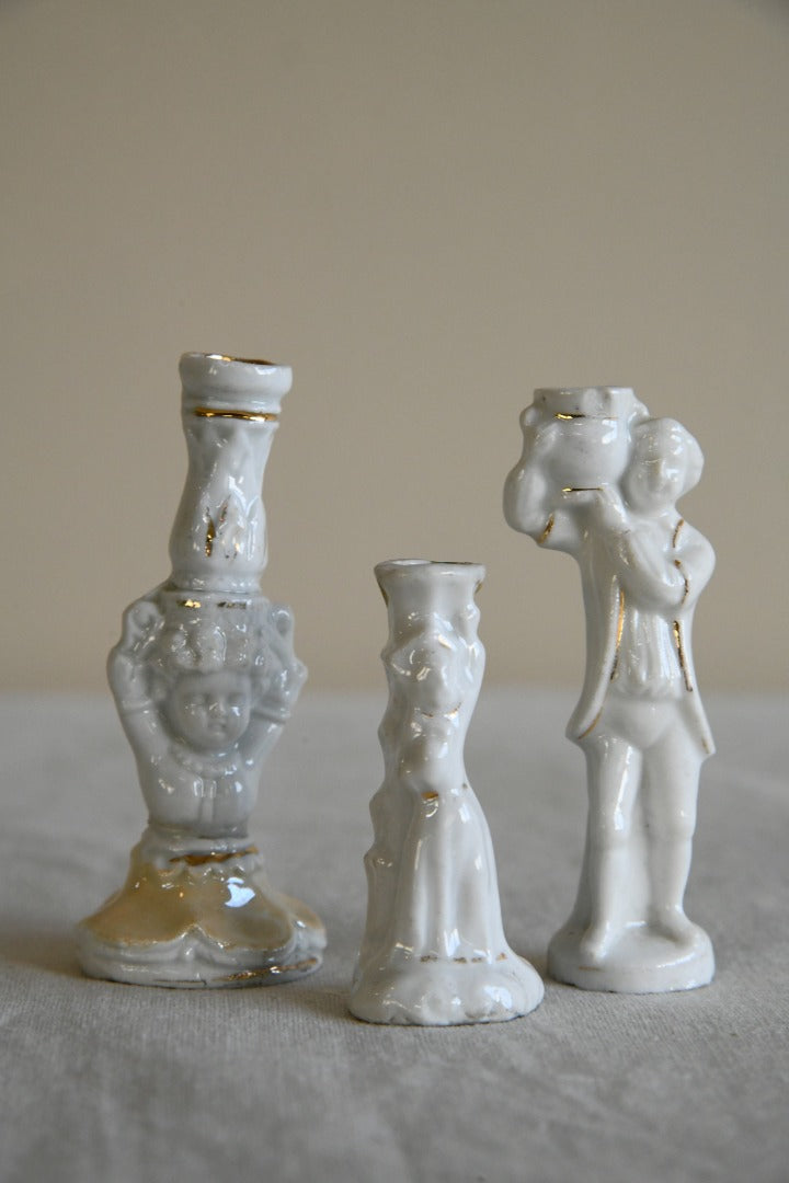 Three Small White Bud Vase