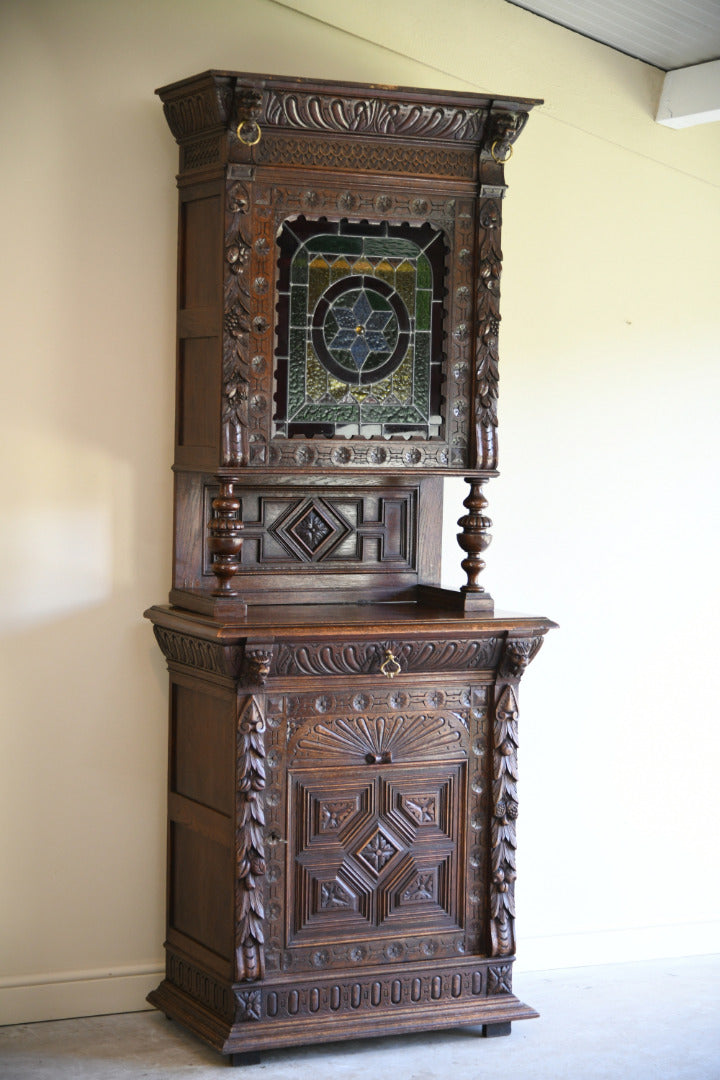 Carved Oak Continental Cabinet
