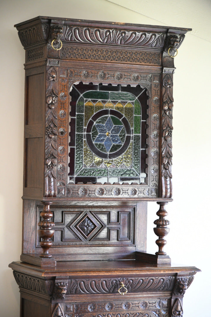 Carved Oak Continental Cabinet