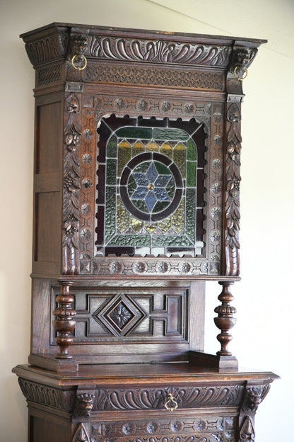 Carved Oak Continental Cabinet