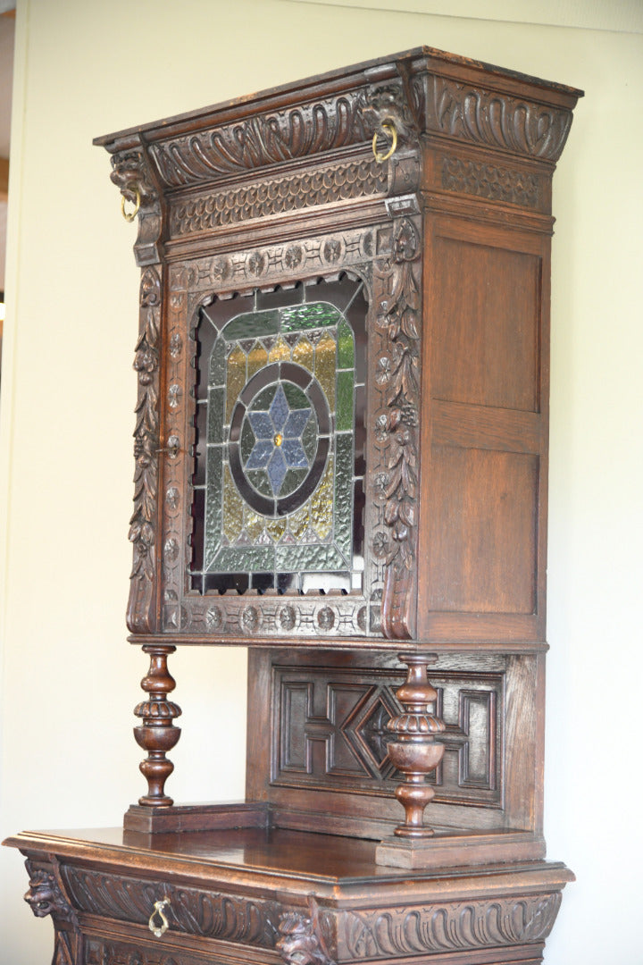 Carved Oak Continental Cabinet