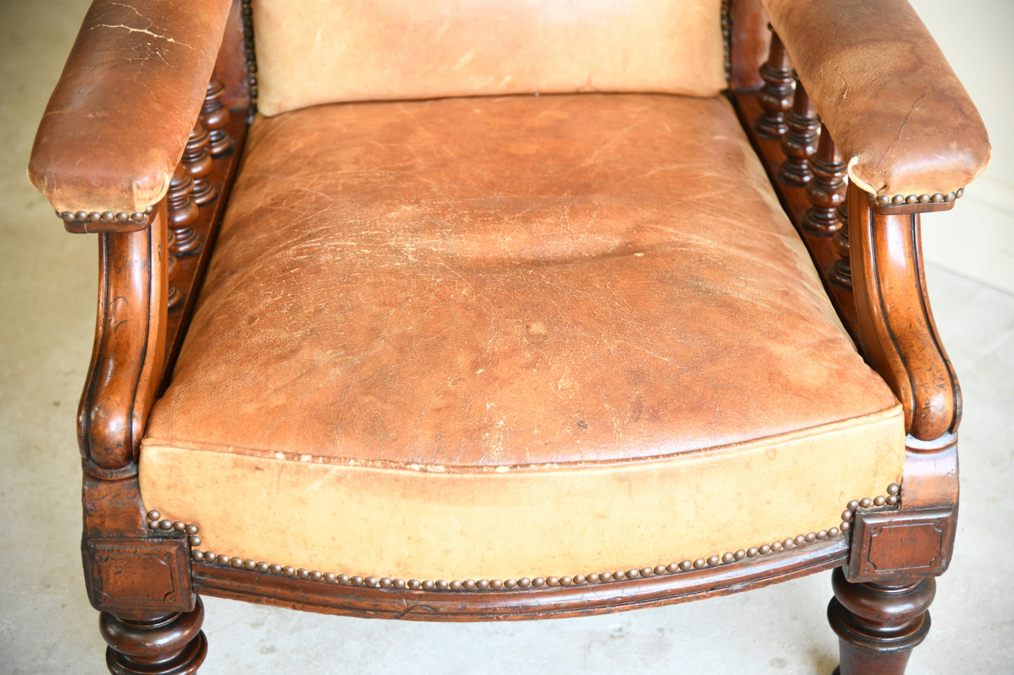 Antique Leather Upholstered Armchair