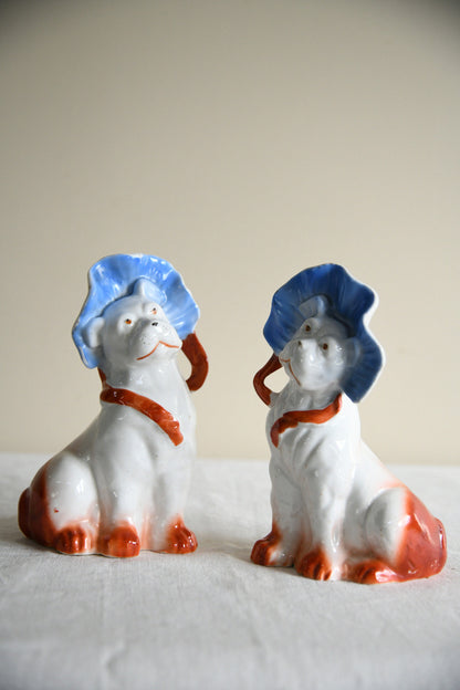 Pair of Vintage Porcelain Dog Figurines in Blue Bonnets