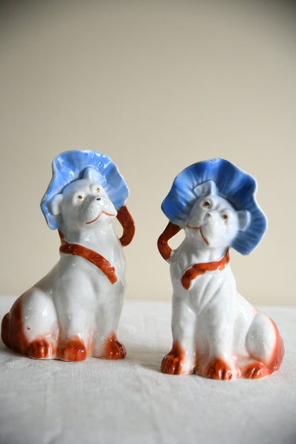 Pair of Vintage Porcelain Dog Figurines in Blue Bonnets