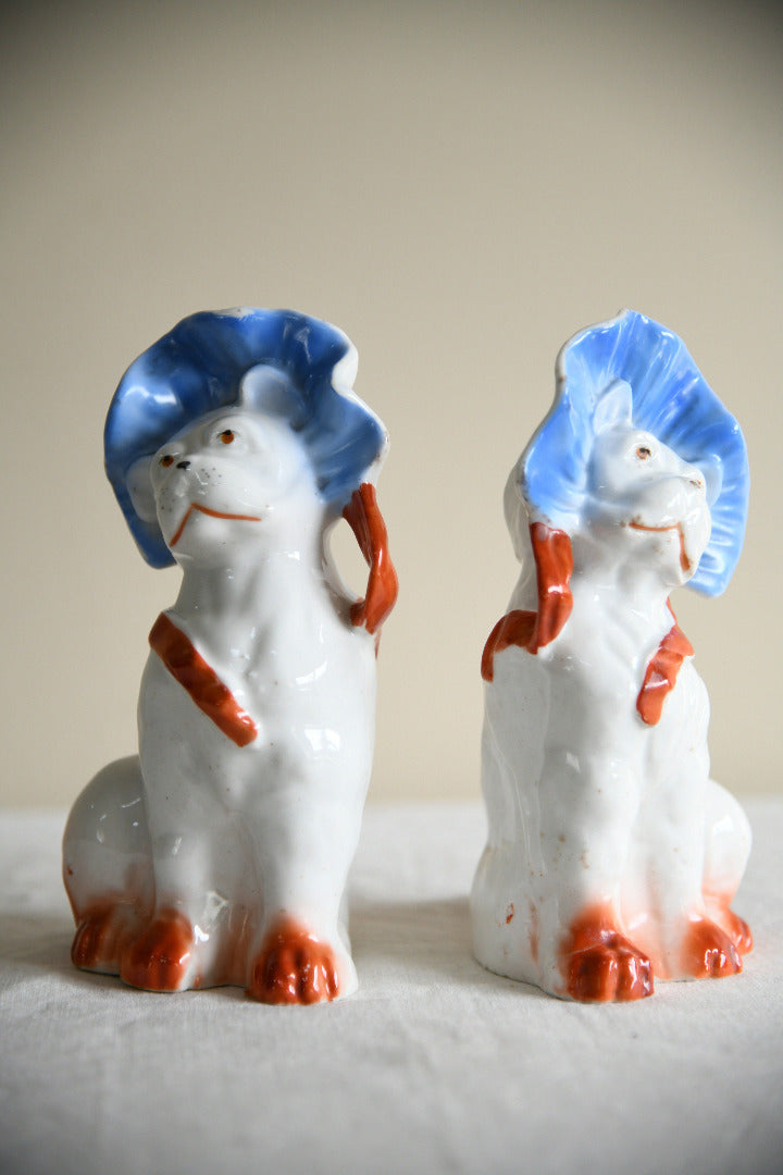Pair of Vintage Porcelain Dog Figurines in Blue Bonnets