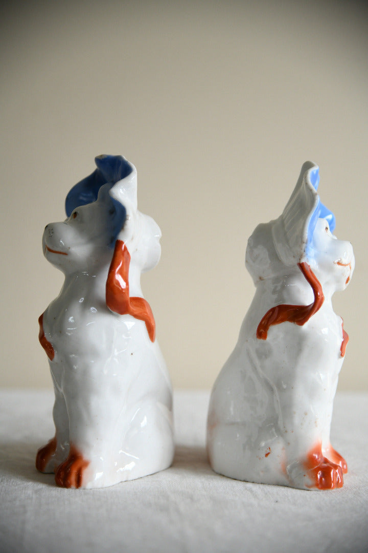 Pair of Vintage Porcelain Dog Figurines in Blue Bonnets