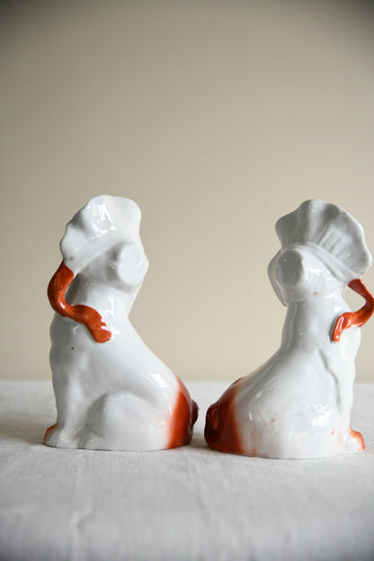 Pair of Vintage Porcelain Dog Figurines in Blue Bonnets