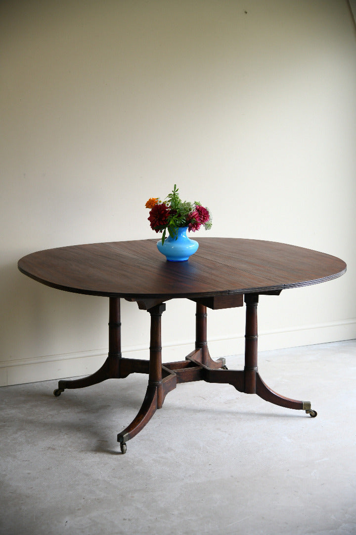 Early 19th Century Mahogany Drop Leaf Dining Table