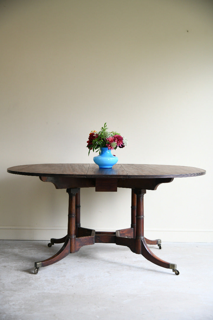 Early 19th Century Mahogany Drop Leaf Dining Table