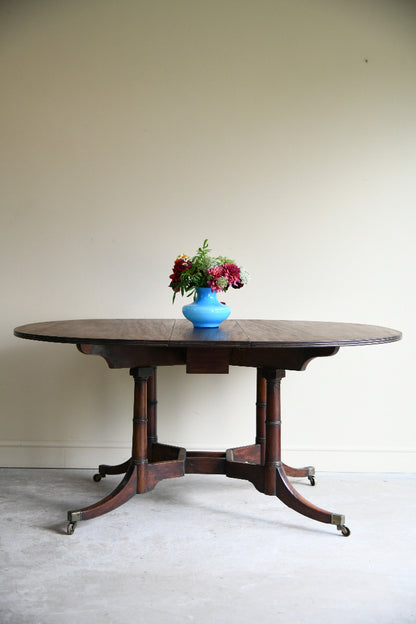 Early 19th Century Mahogany Drop Leaf Dining Table