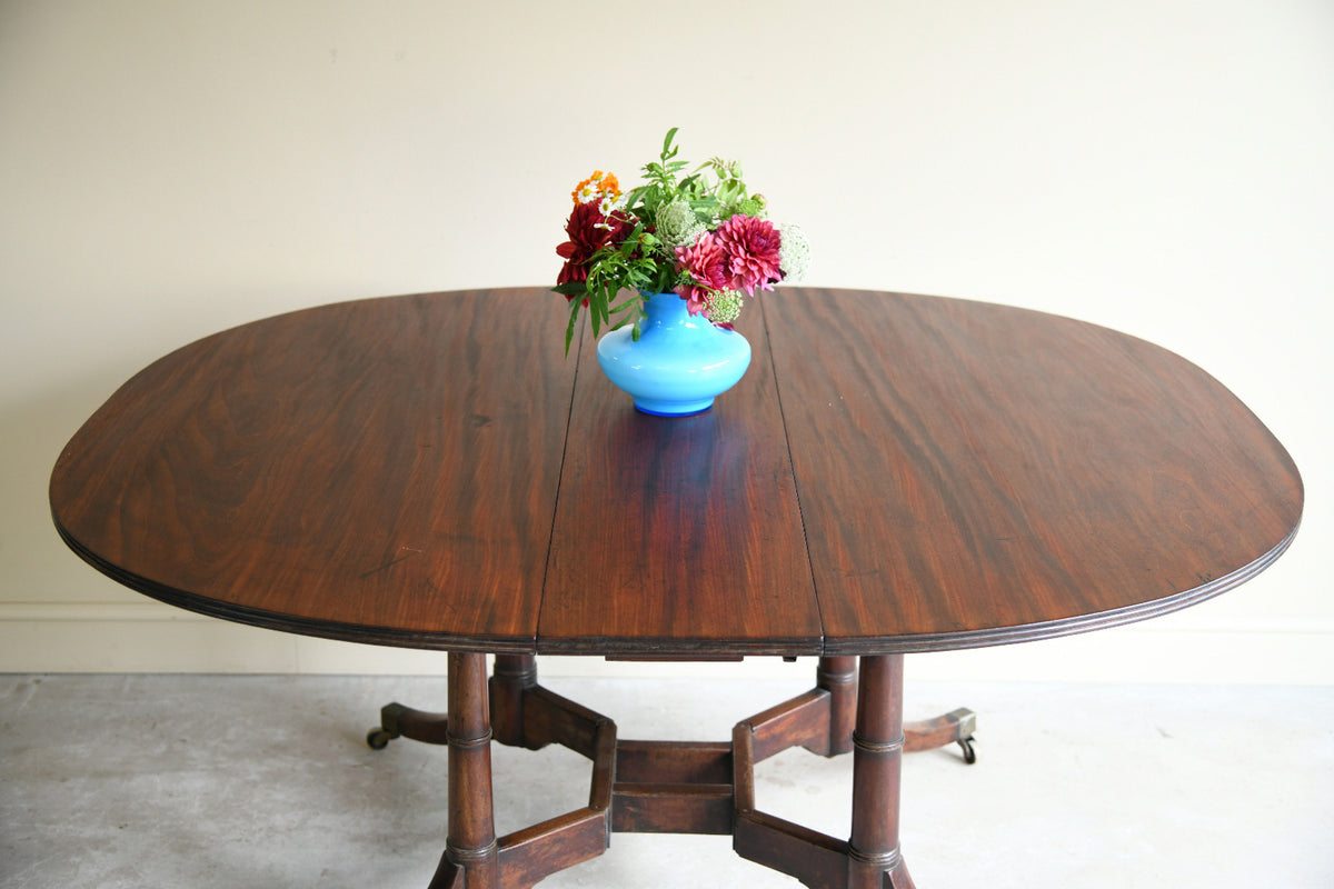 Early 19th Century Mahogany Drop Leaf Dining Table