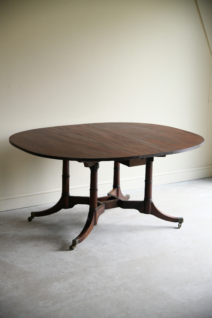 Early 19th Century Mahogany Drop Leaf Dining Table