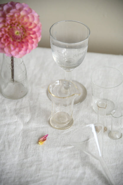 Collection of Vintage Glass Medicine Measures