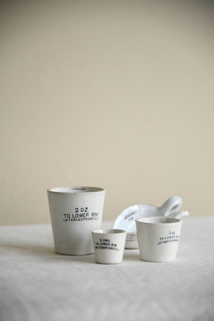 Collection of Vintage White Ironstone Medicinal Measures