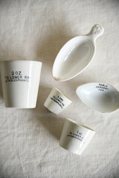 Collection of Vintage White Ironstone Medicinal Measures