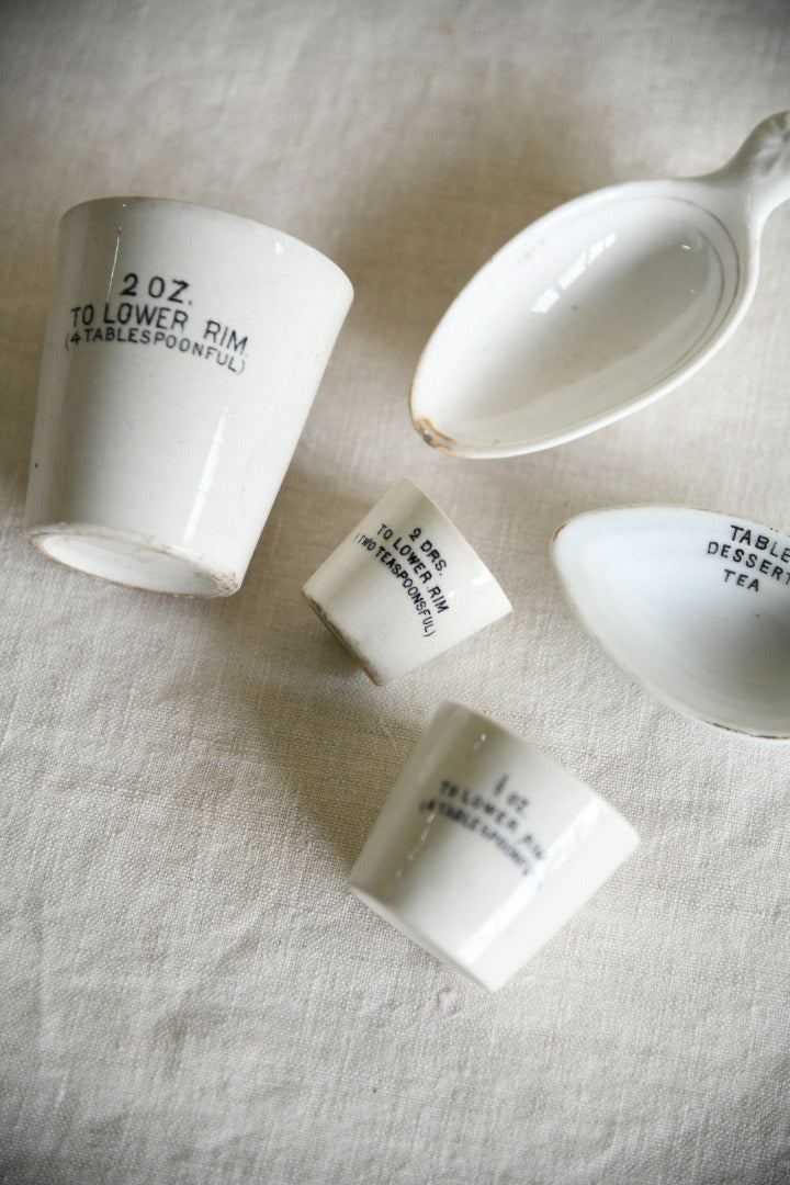 Collection of Vintage White Ironstone Medicinal Measures