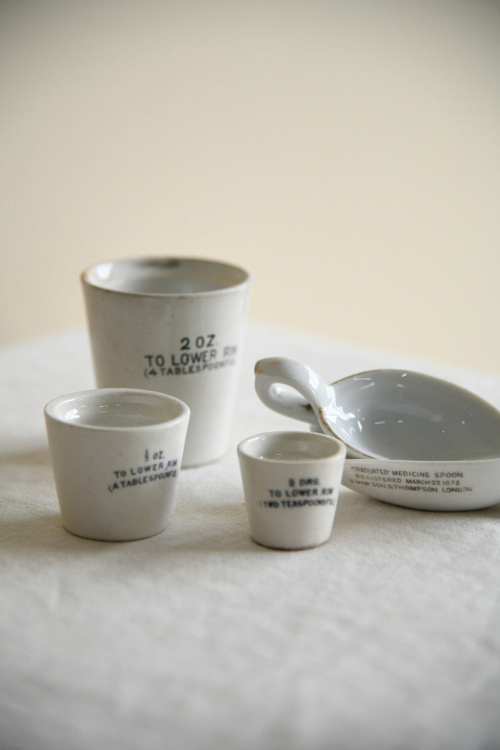 Collection of Vintage White Ironstone Medicinal Measures