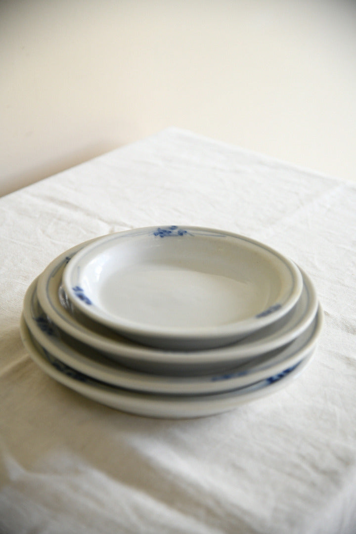 Four Antique French Ironstone Hand Painted Blue and White Plates