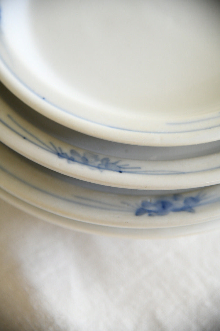 Four Antique French Ironstone Hand Painted Blue and White Plates