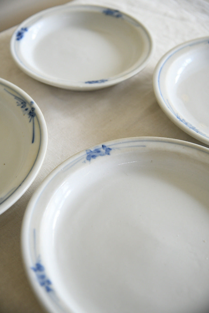 Four Antique French Ironstone Hand Painted Blue and White Plates