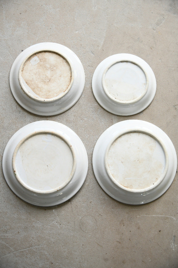 Four Antique French Ironstone Hand Painted Blue and White Plates