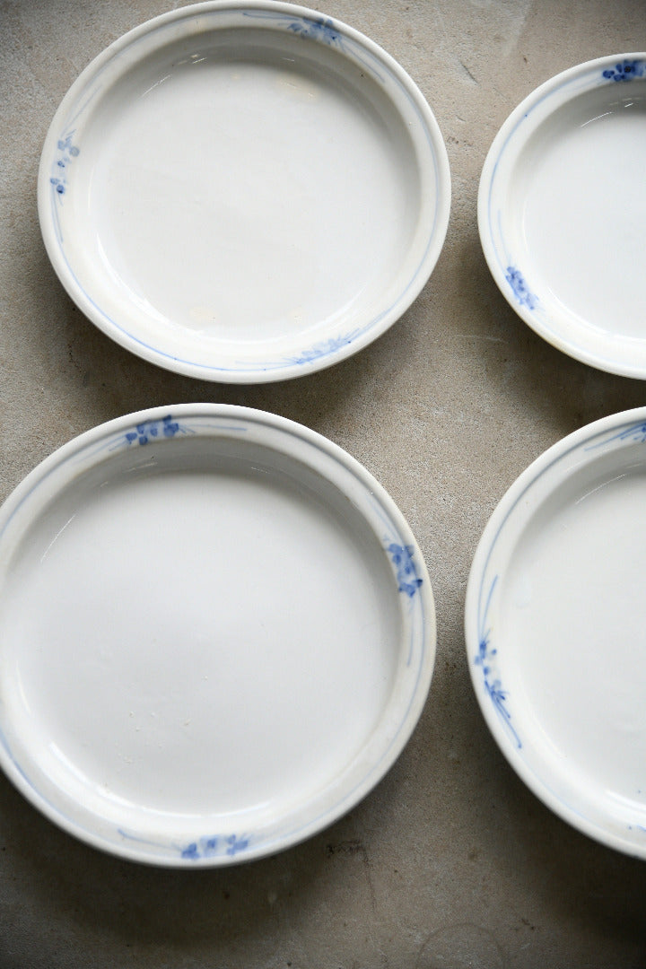 Four Antique French Ironstone Hand Painted Blue and White Plates
