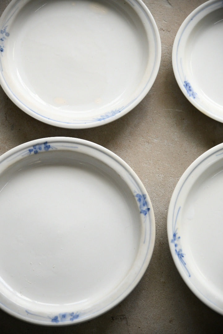 Four Antique French Ironstone Hand Painted Blue and White Plates