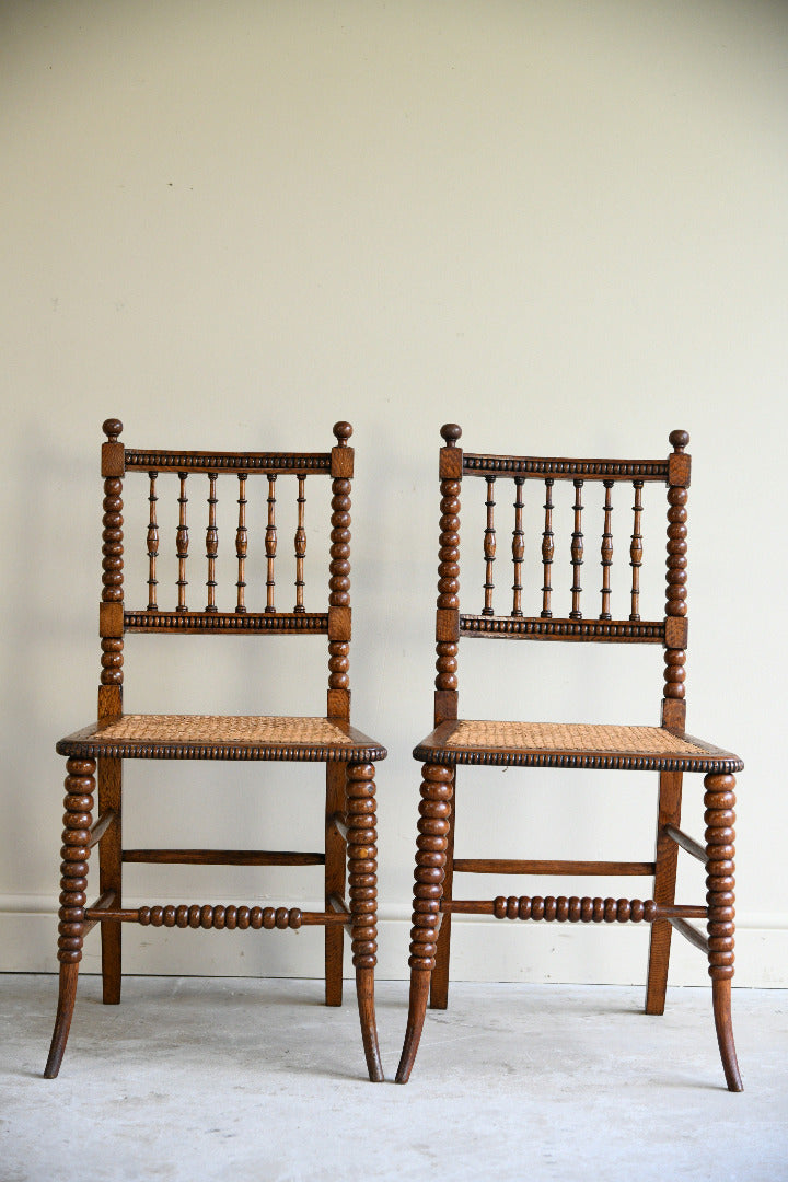 Antique Pair Oak Bobbin Turned Chairs with Cane Seats