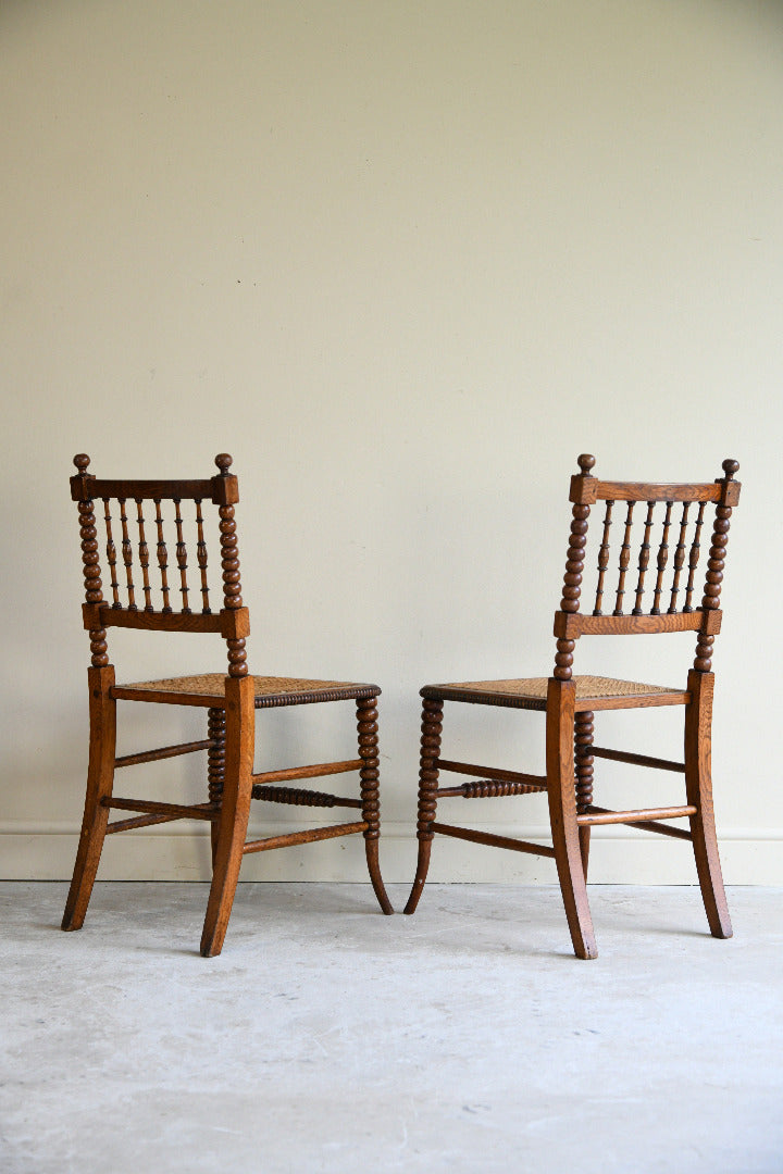 Antique Pair Oak Bobbin Turned Chairs with Cane Seats