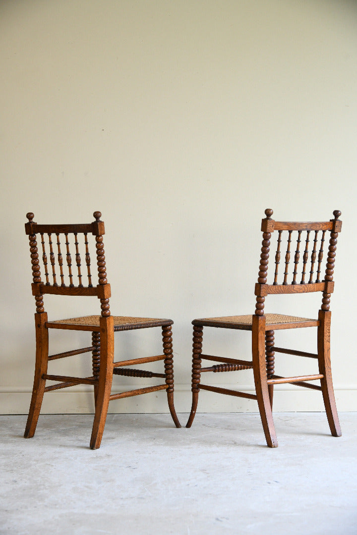 Antique Pair Oak Bobbin Turned Chairs with Cane Seats