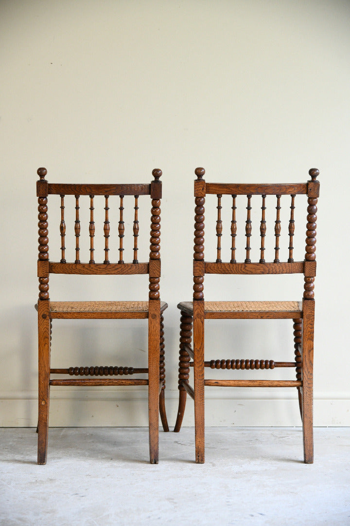 Antique Pair Oak Bobbin Turned Chairs with Cane Seats