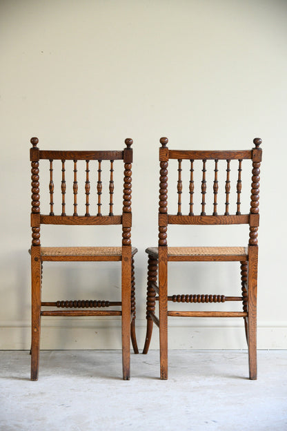 Antique Pair Oak Bobbin Turned Chairs with Cane Seats
