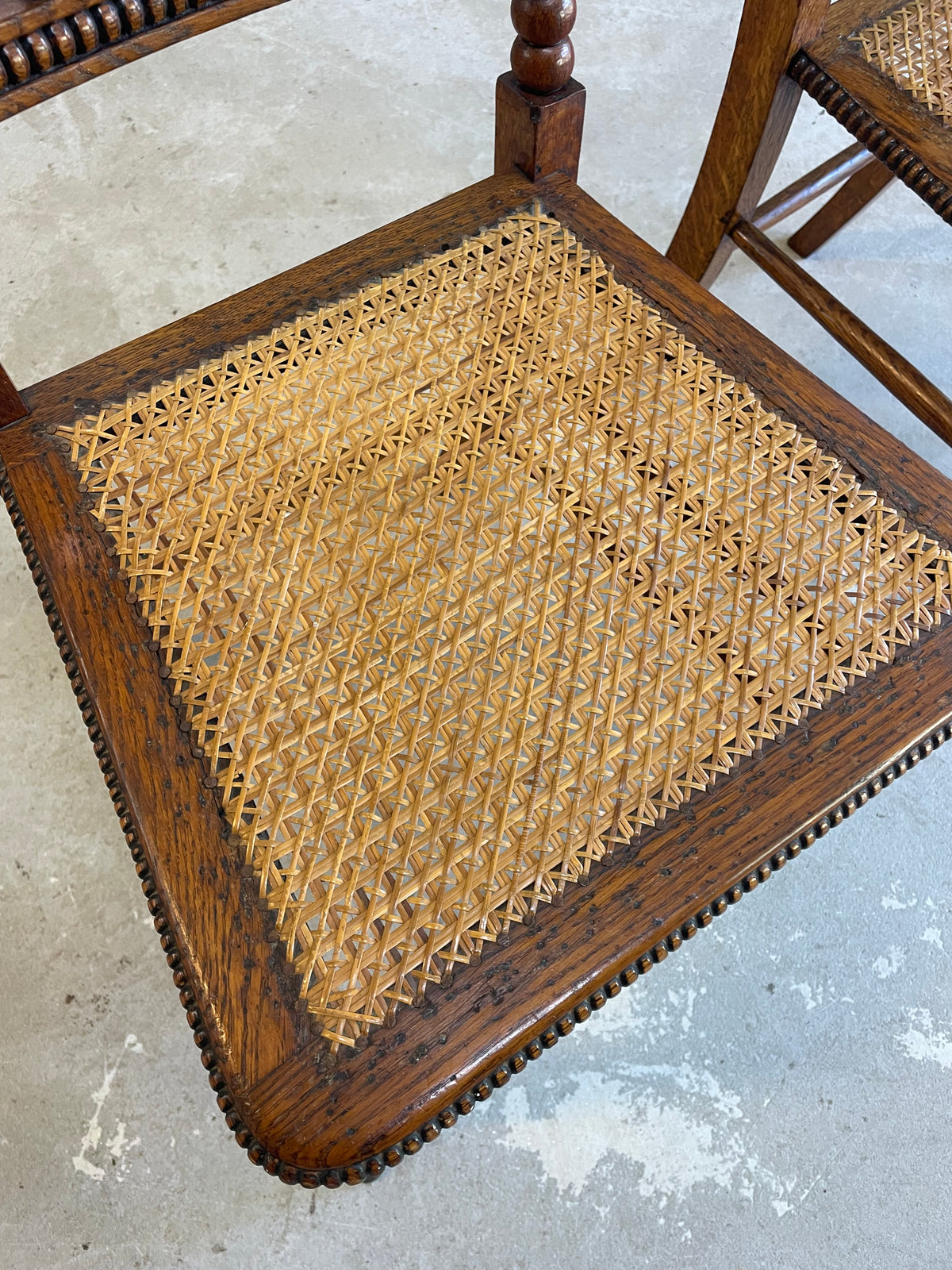 Antique Pair Oak Bobbin Turned Chairs with Cane Seats