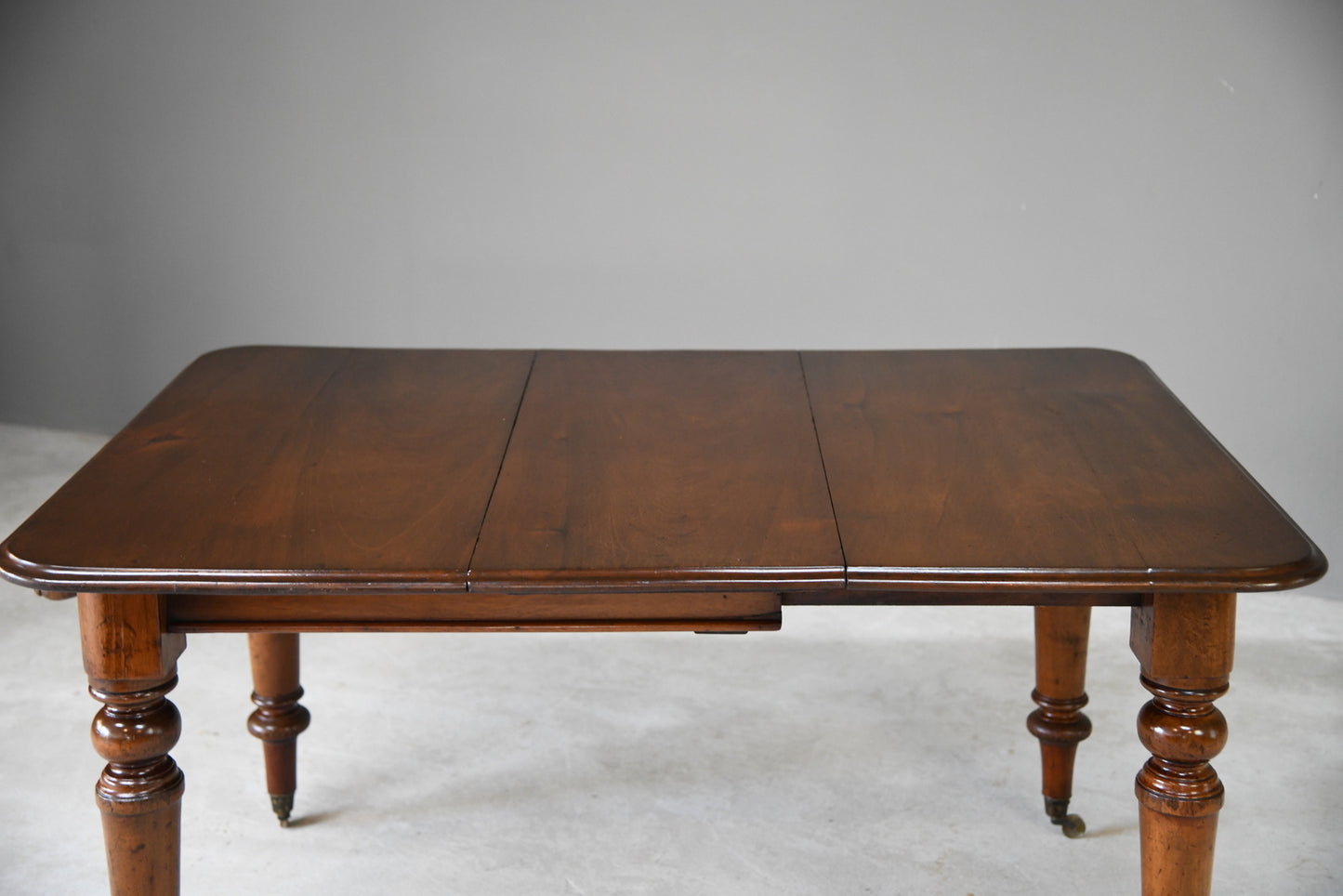 Antique Wind Out Dining Table