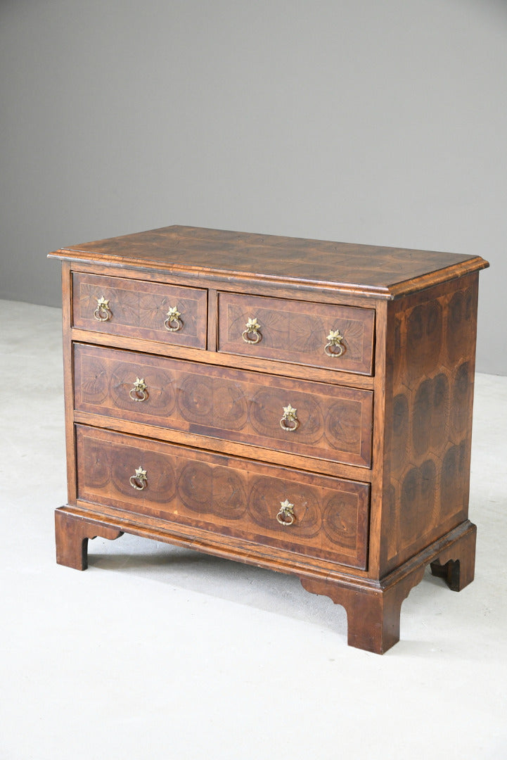 Walnut Oyster Chest of Drawers