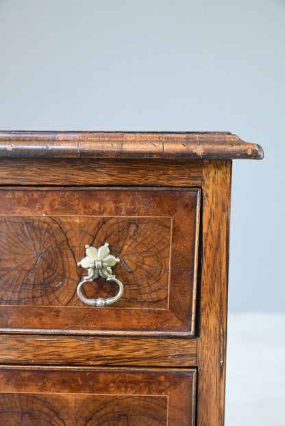 Walnut Oyster Chest of Drawers