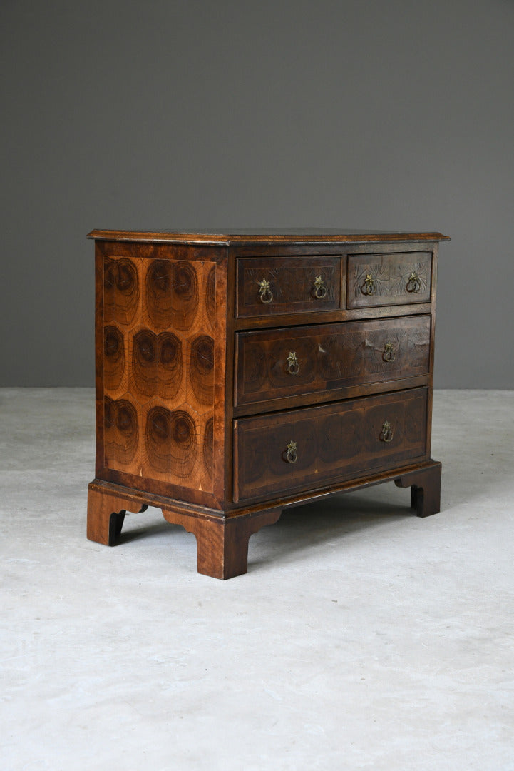 Walnut Oyster Chest of Drawers