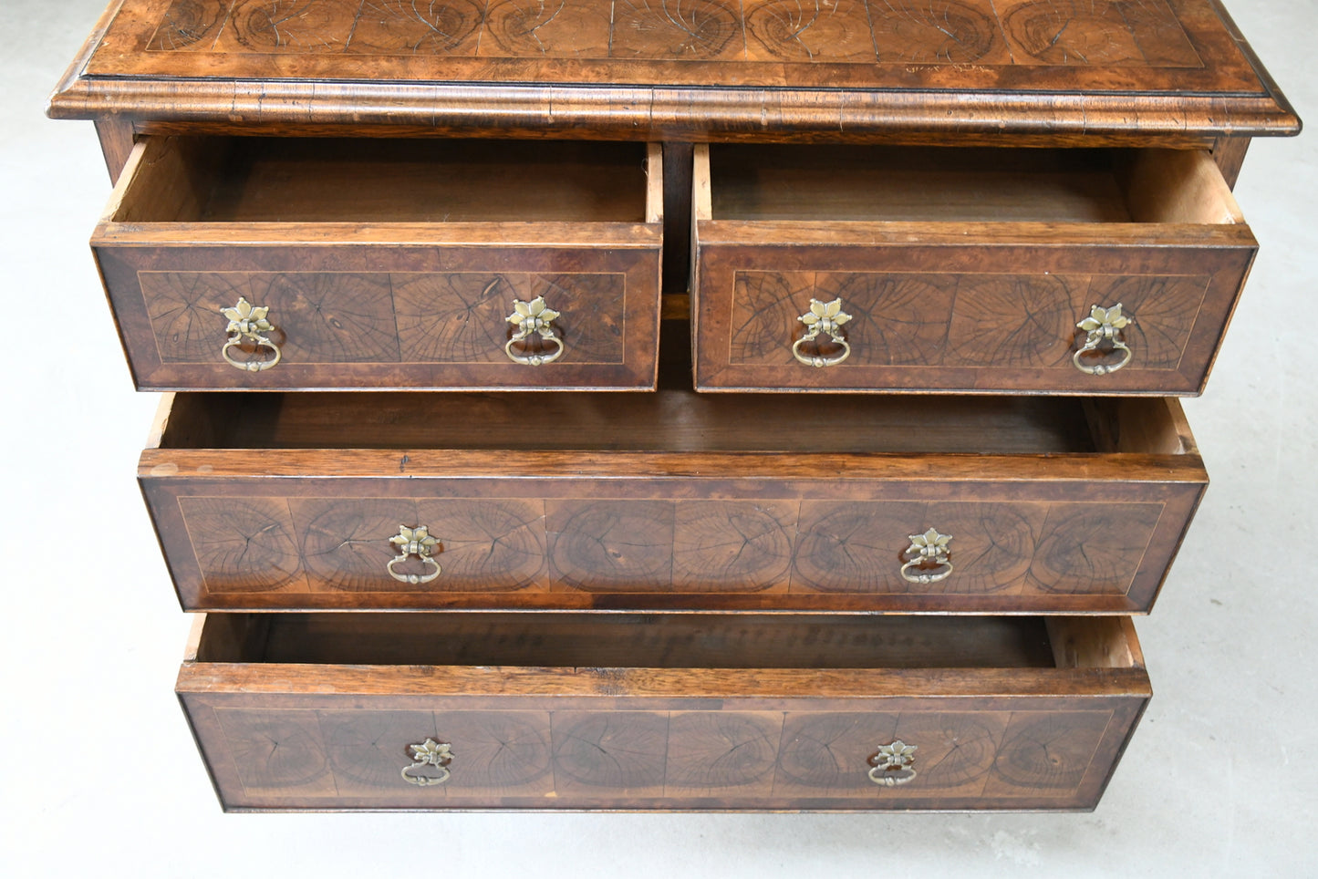 Walnut Oyster Chest of Drawers