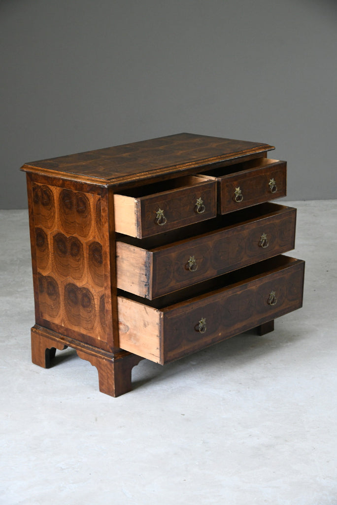 Walnut Oyster Chest of Drawers