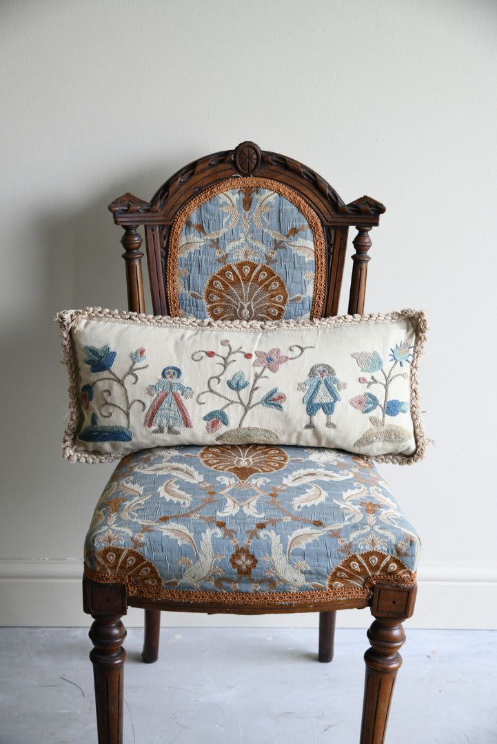 Two Embroidered Cushions