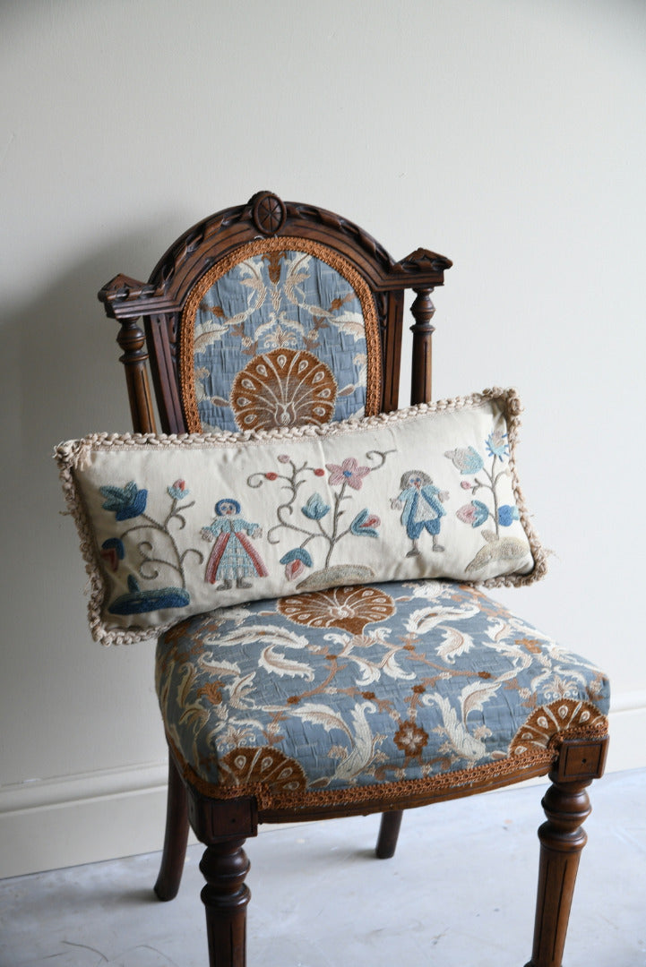 Two Embroidered Cushions