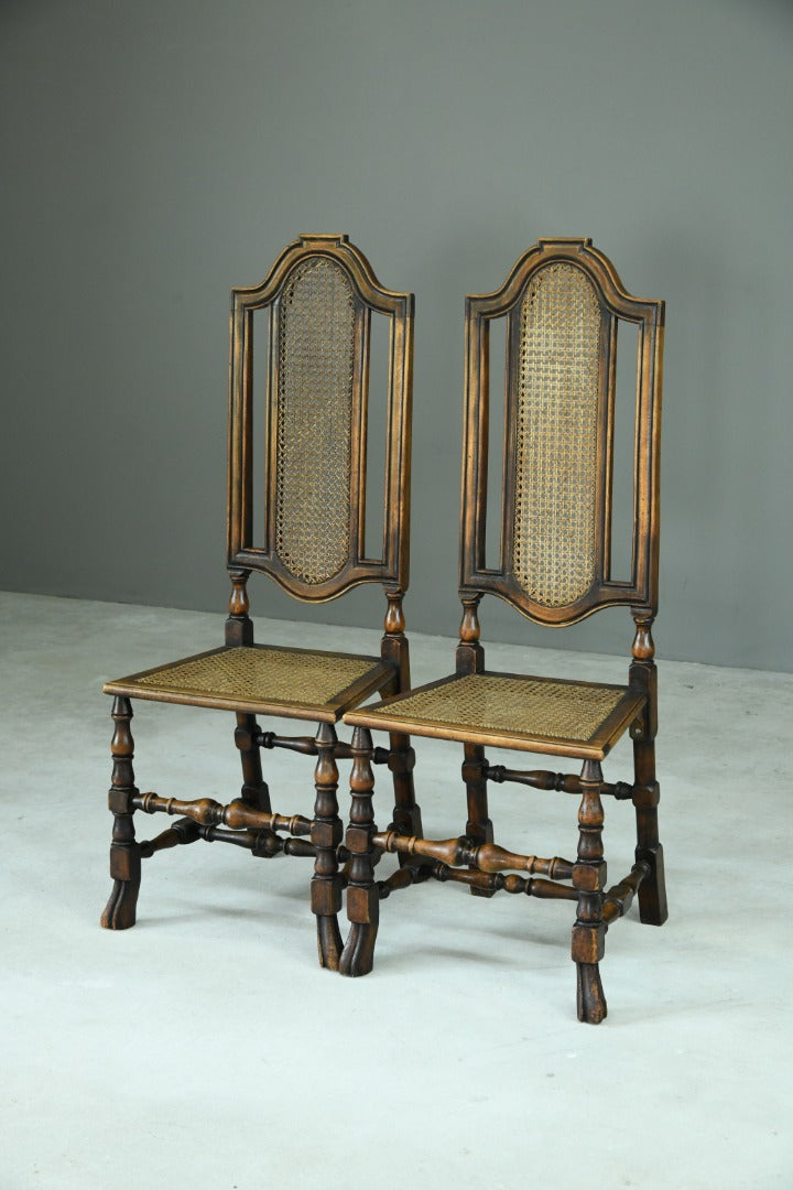 Pair Walnut and Cane Carolean Chairs