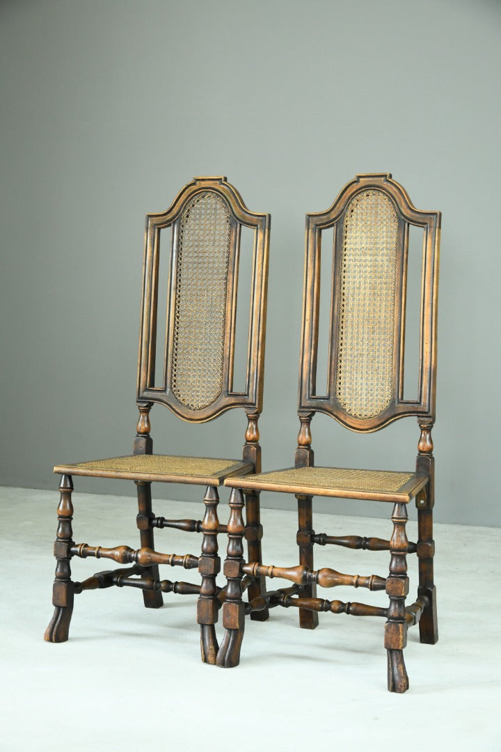 Pair Walnut and Cane Carolean Chairs