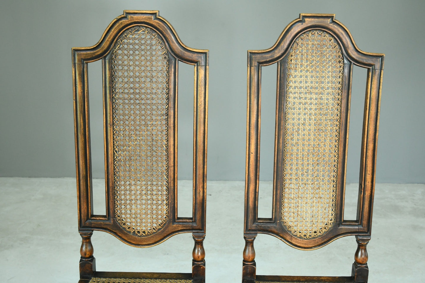 Pair Walnut and Cane Carolean Chairs