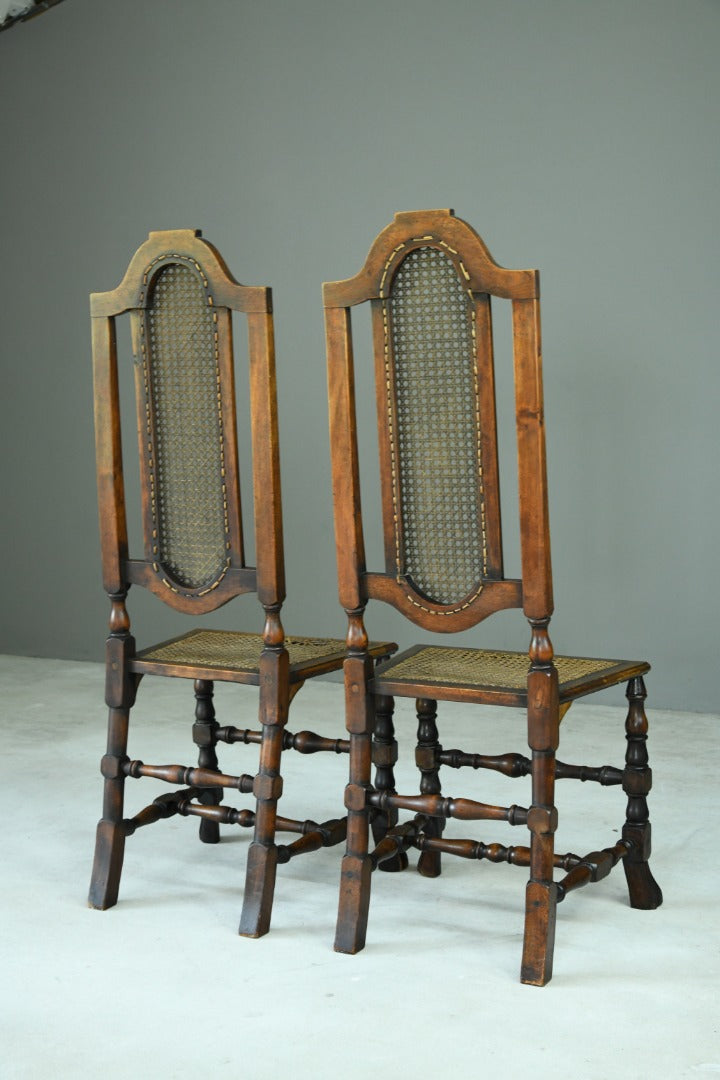 Pair Walnut and Cane Carolean Chairs