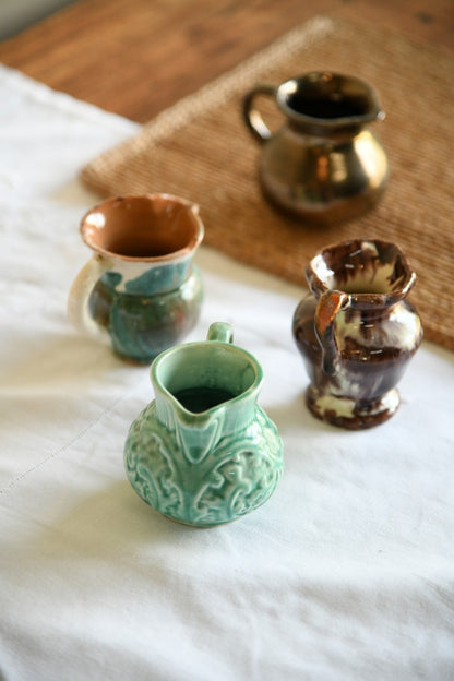 4 Miniature Jugs