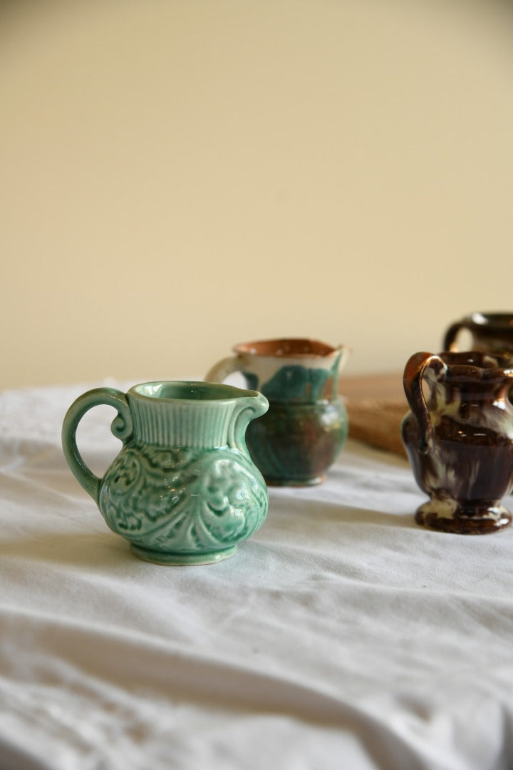 4 Miniature Jugs